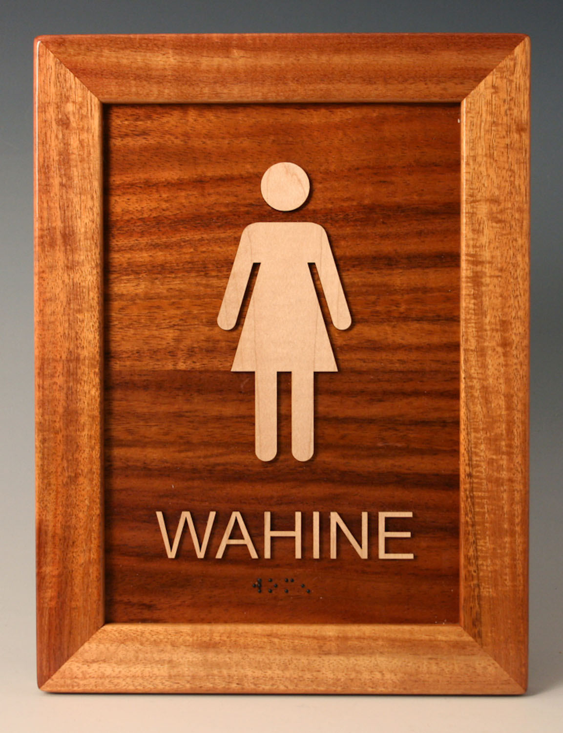 Tactile letters and pictogram along with Grade 2 Braille | Solid Koa & Koa veneer | UV-resistant polyurethane finish